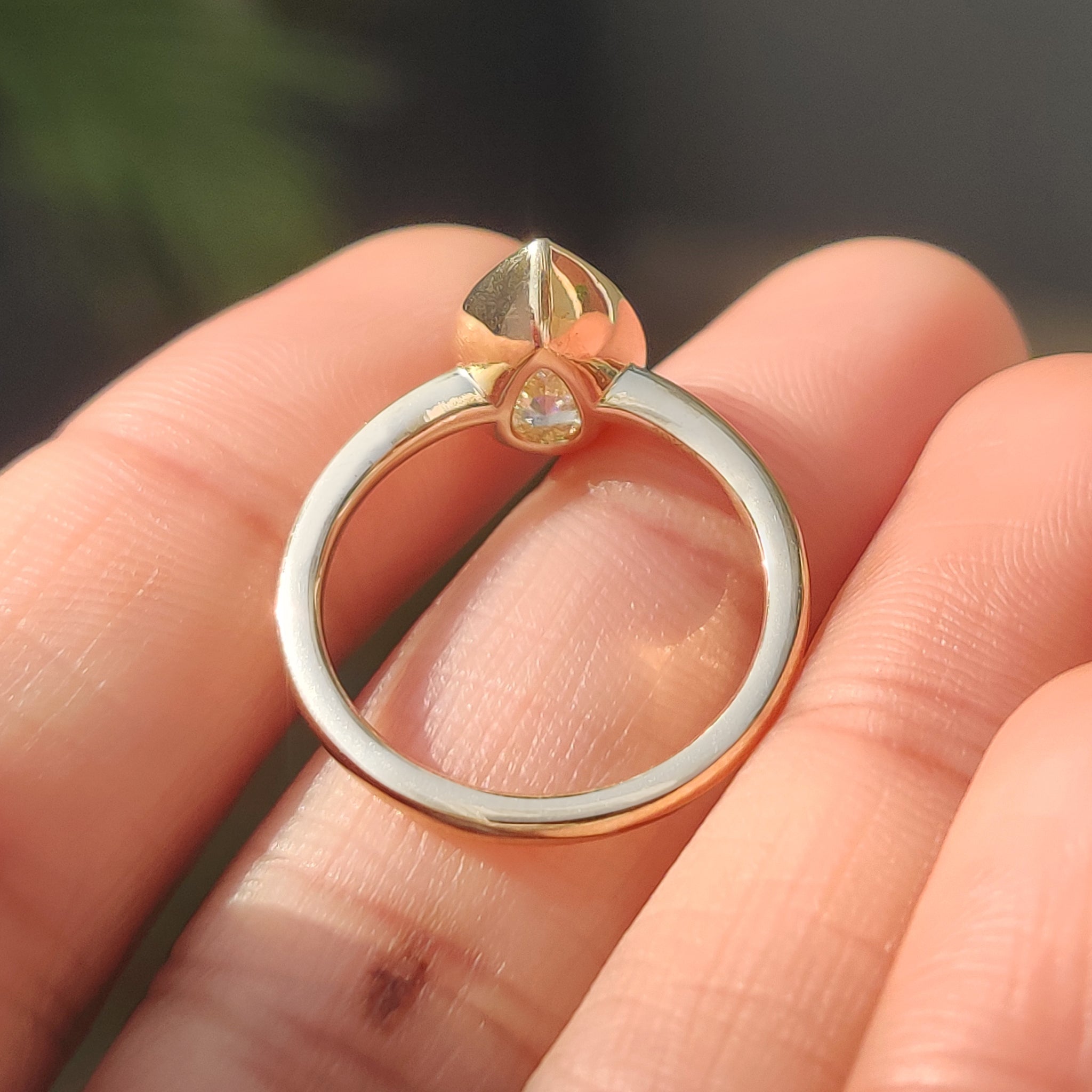 Pear Cut Diamond Ring in Bezel Type Prong Setting