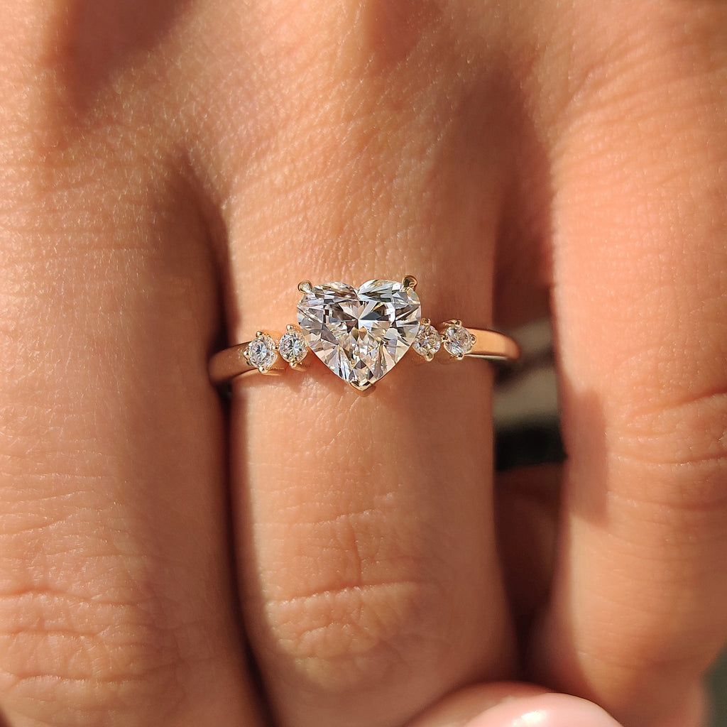 Heart Cut Diamond Ring With Round Side Stones