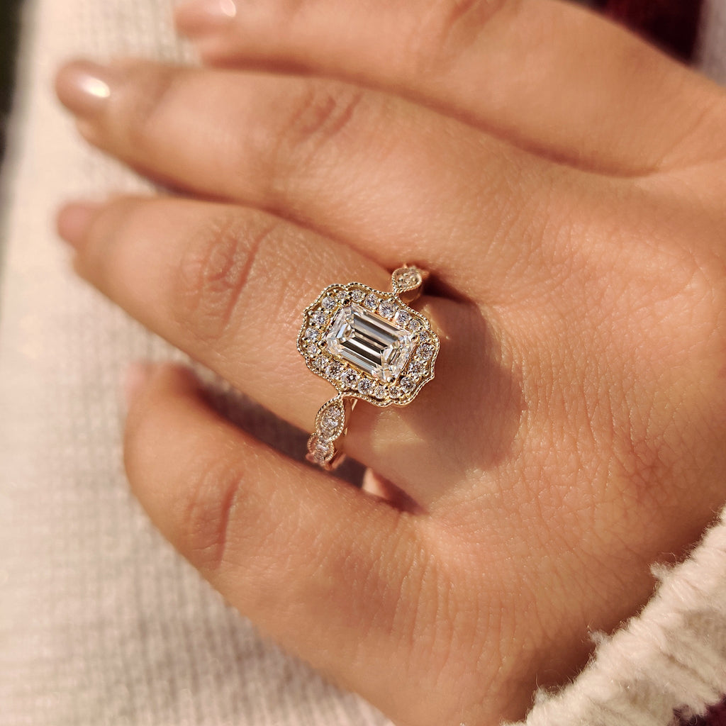 Emerald Cut Diamond Ring in Round Diamond Halo Style