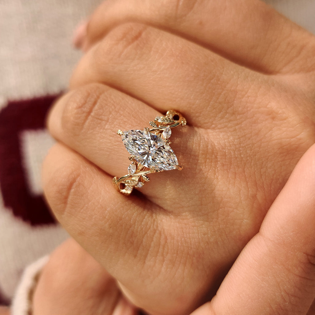 Nature Inspired Marquise Diamond Ring with Secure Leaf Style Prong