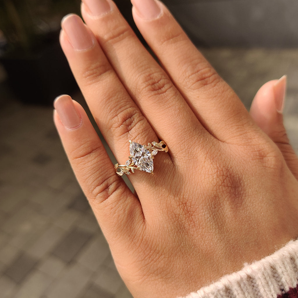 Nature Inspired Marquise Diamond Ring with Secure Leaf Style Prong