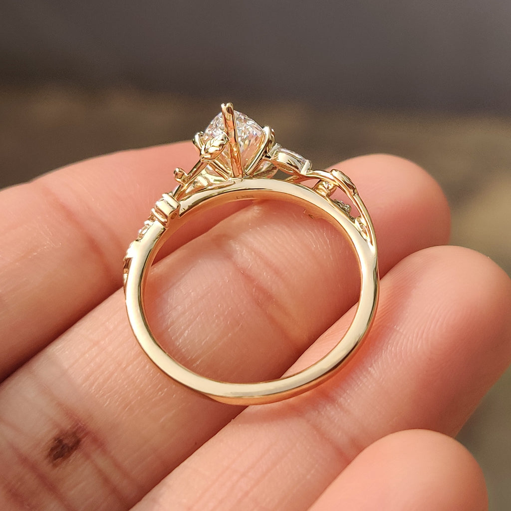 Nature Inspired Marquise Diamond Ring with Secure Leaf Style Prong