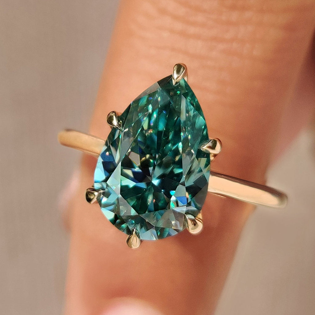 Cyan Blue Pear Cut Moissanite Ring in Solitaire Style