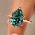 Cyan Blue Pear Cut Moissanite Ring in Solitaire Style