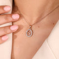 Halo Style Taurus Pendant In Rose Gold
