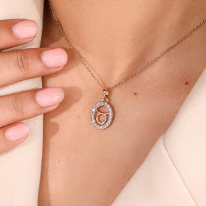 Halo Style Taurus Pendant In Rose Gold