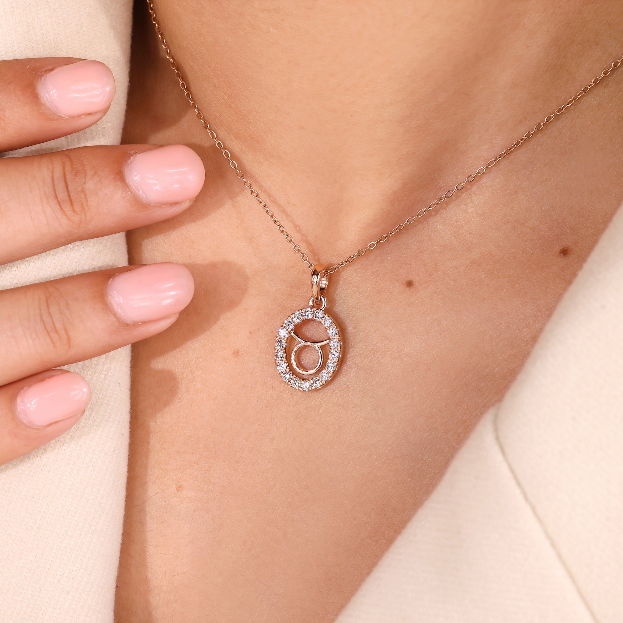 Halo Style Taurus Pendant In Rose Gold