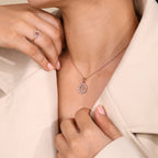 Rose Gold Gemini Pendant In Halo Setting