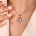 Rose Gold Gemini Pendant In Halo Setting