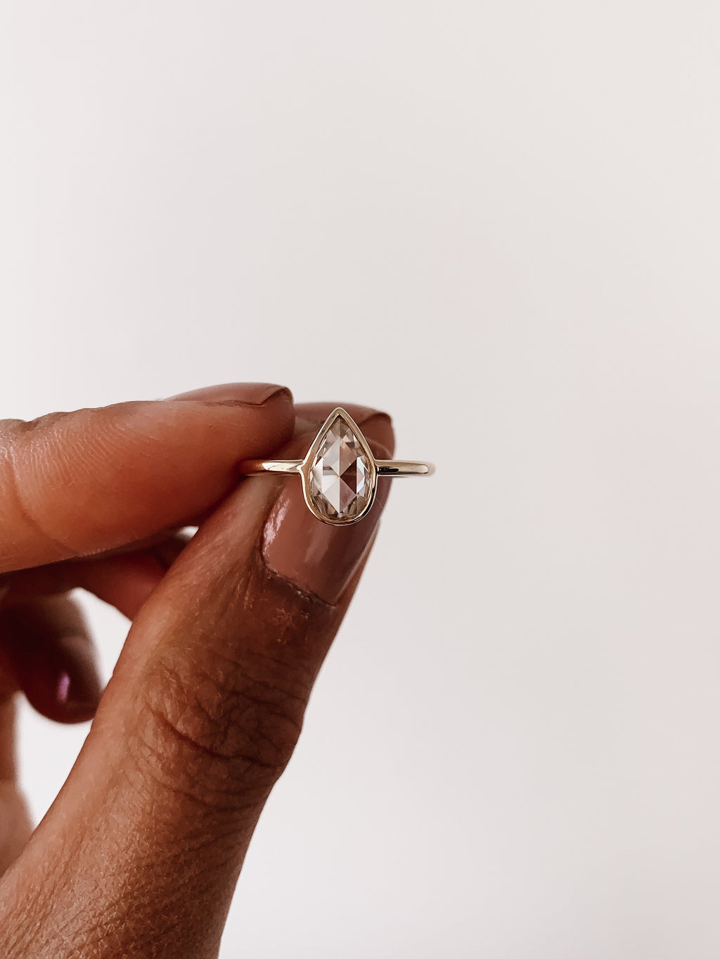 0.80 CT Pear Cut Moissanite Bezel Style Engagement Ring