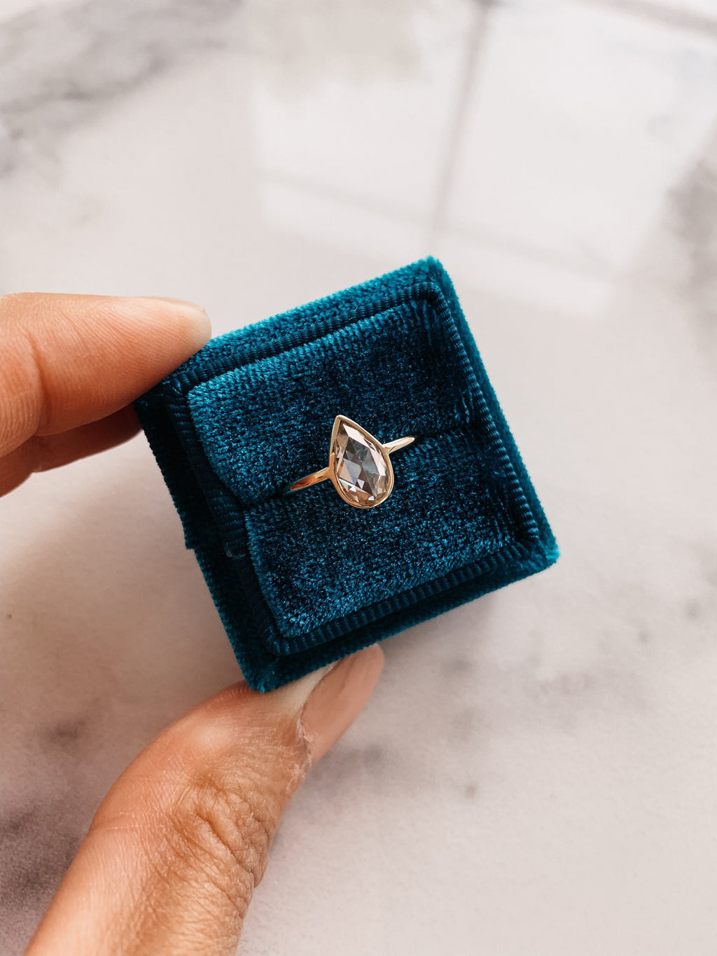 0.80 CT Pear Cut Moissanite Bezel Style Engagement Ring