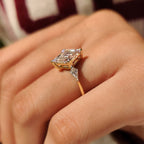 Lozenge Cut Engagement Ring with Kite Cut Side Stone