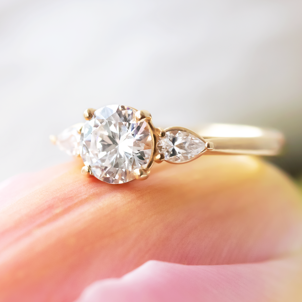 1.0 CT Round Cut Three Stone Style Moissanite Engagement Ring