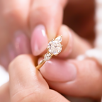 1.0 CT Round Cut Three Stone Style Moissanite Engagement Ring