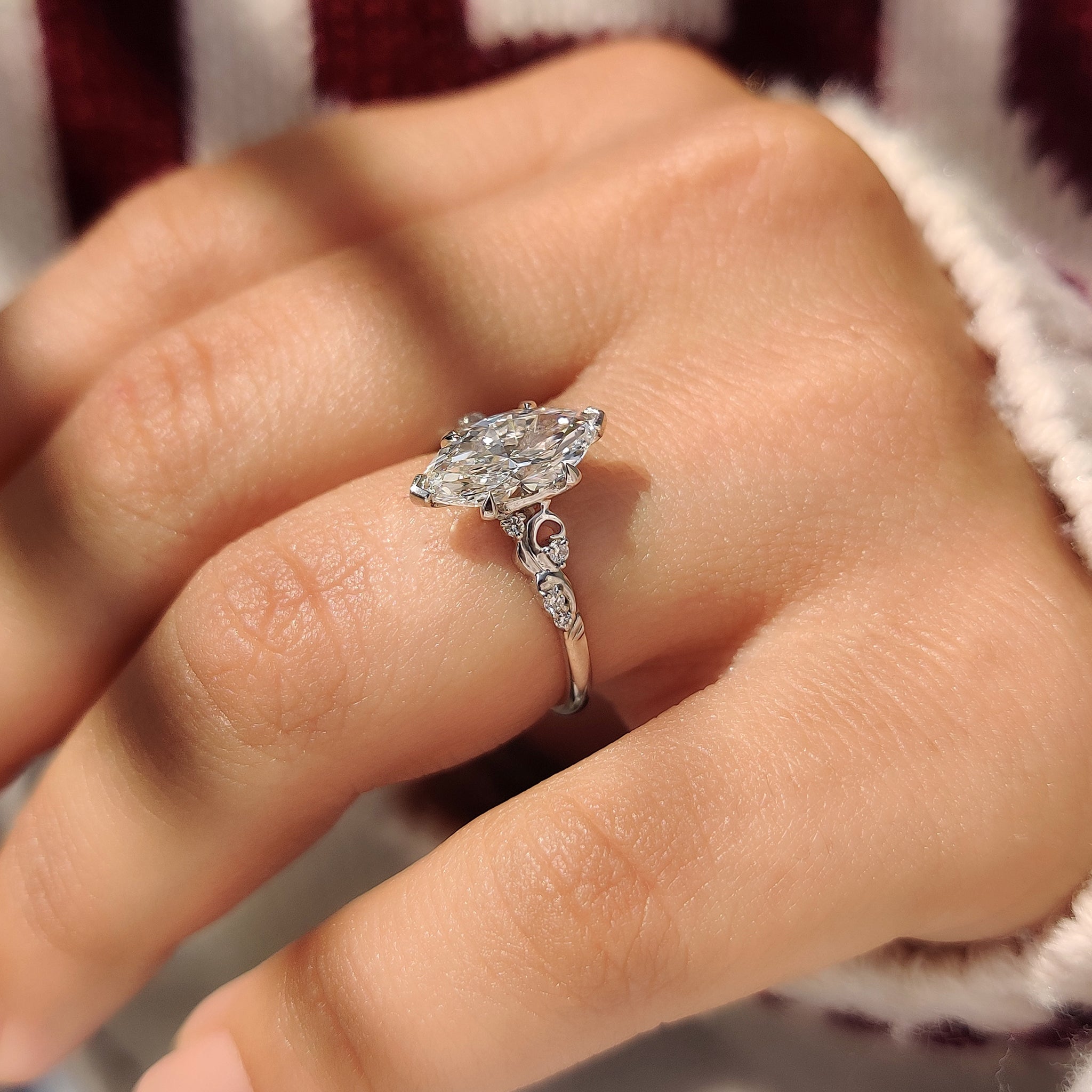 Marquise Cut Diamond Ring in Side Stone Style