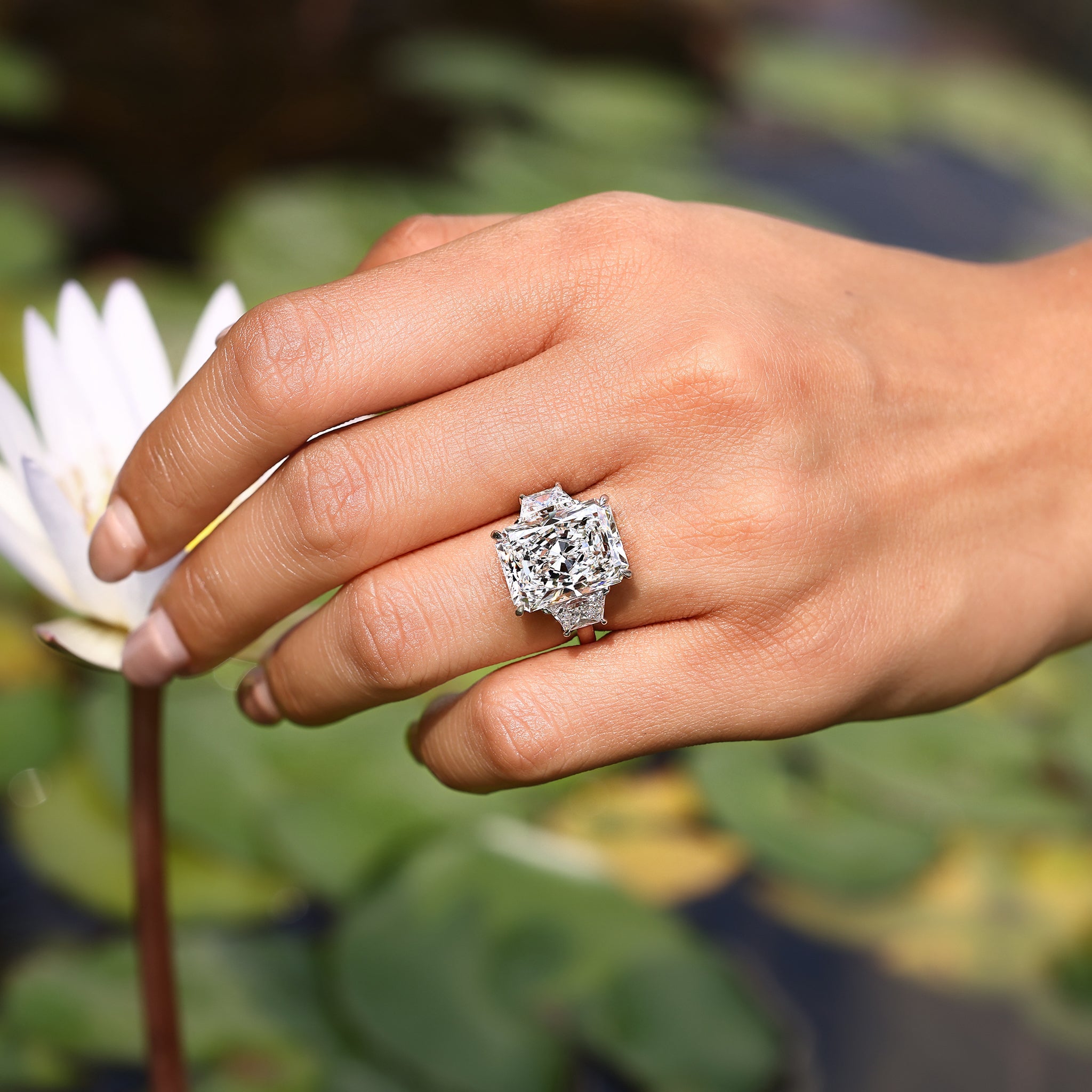 10 - 14 Carat Radiant Cut Diamond Ring with Trapezoid Side Stones Secondary image
