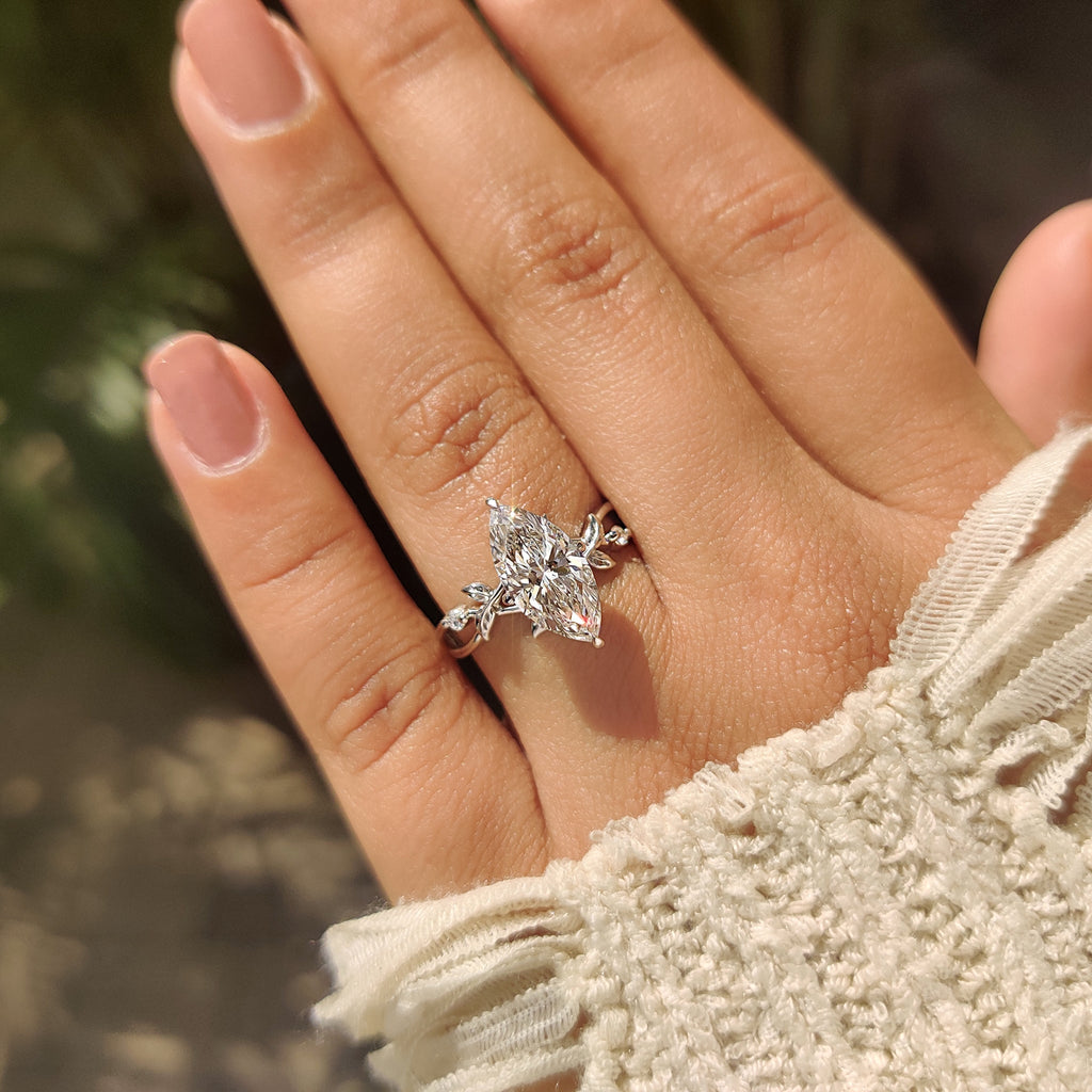 Marquise Cut Ring with Round Side Stone in Nature Inspired Style