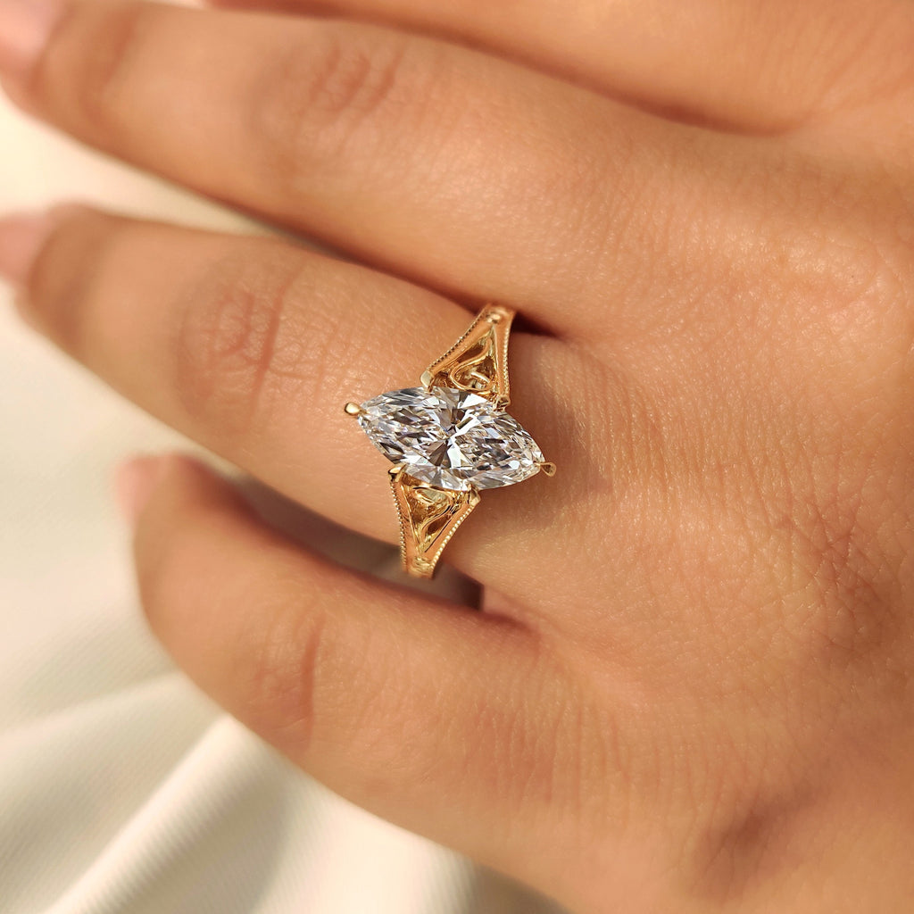 Solitaire Style Marquise Cut Diamond Ring in Milgrain Details