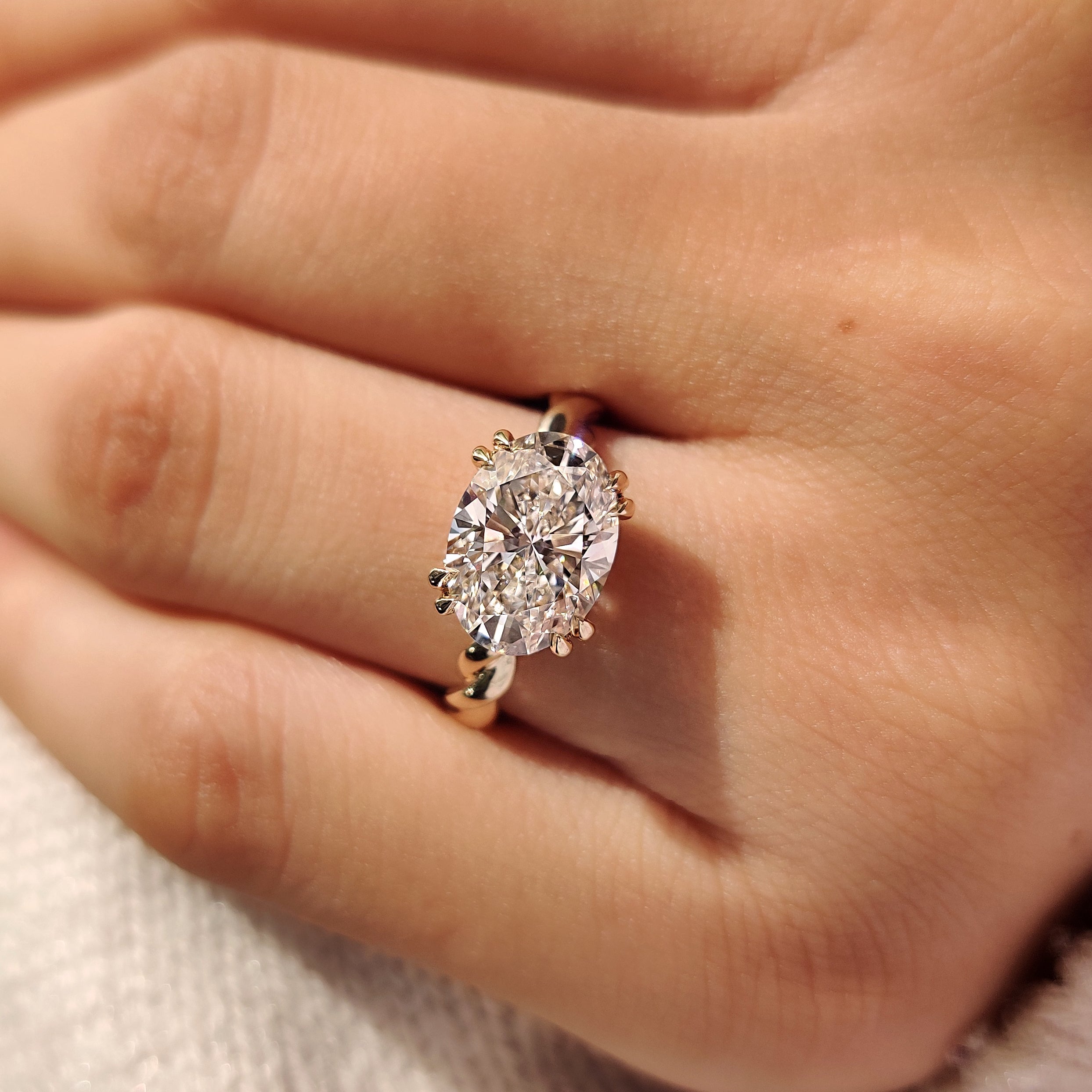 Solitaire Oval Cut Engagement Ring In East To West Setting