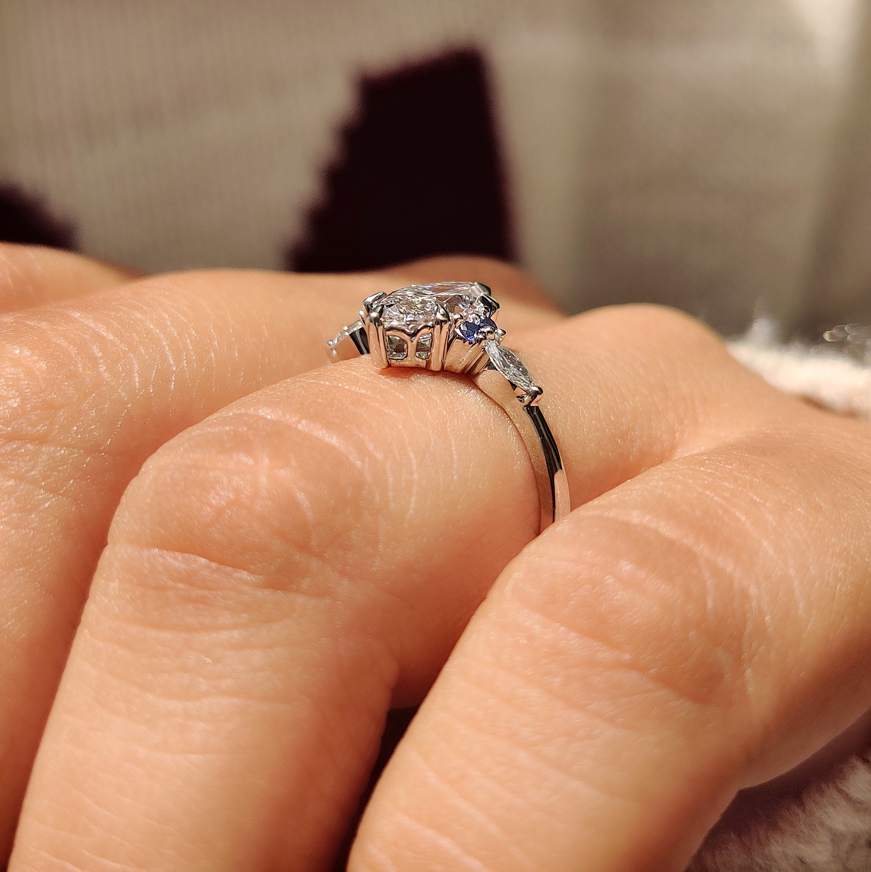 Marquise Cut Engagement Ring With Blue Sapphire Side Stone Style