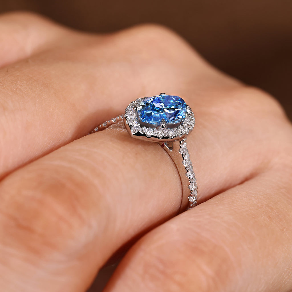 Blue Marquise Cut Diamond Ring in Halo Style