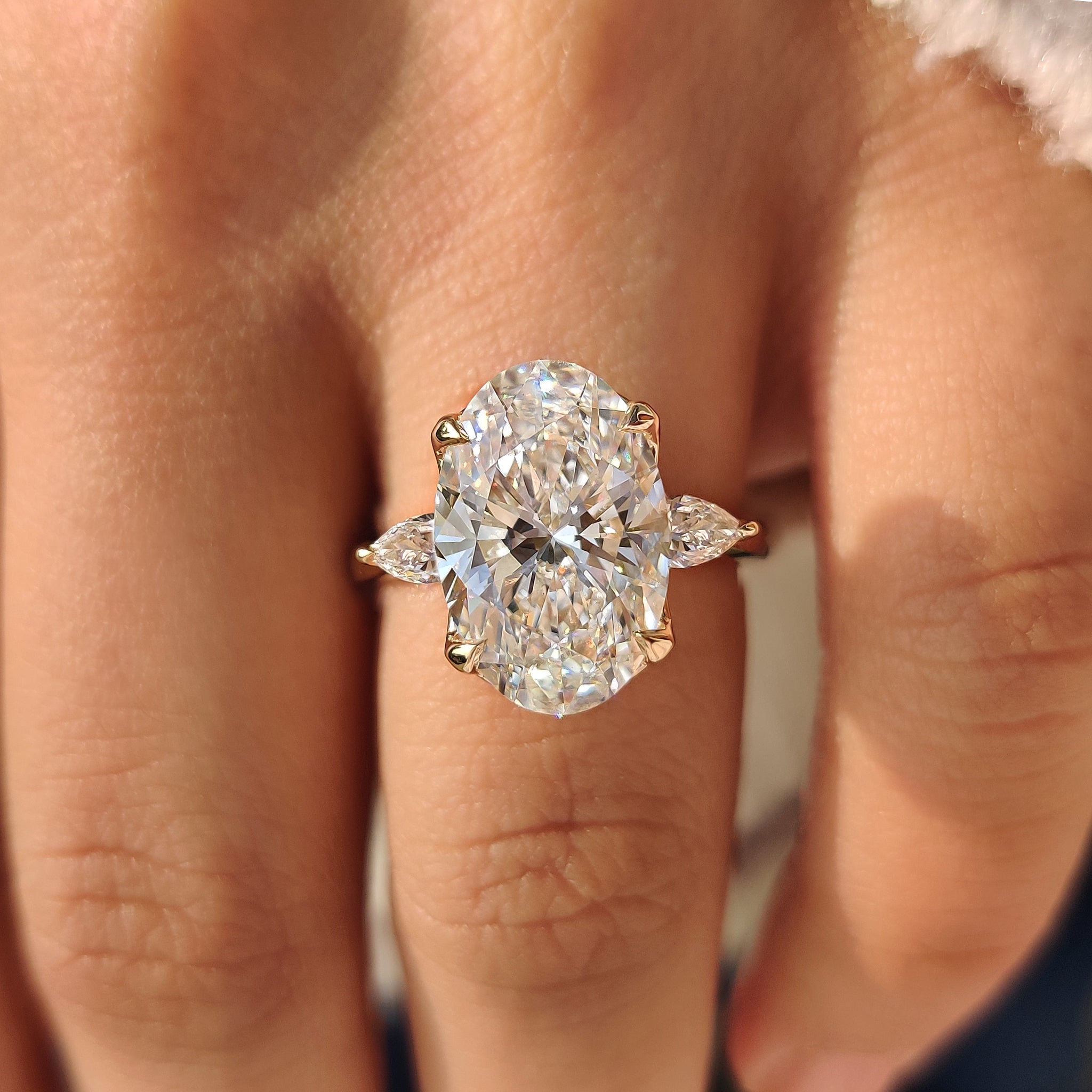 Oval Diamond Three Stone Engagement Ring With Pear Side Stone