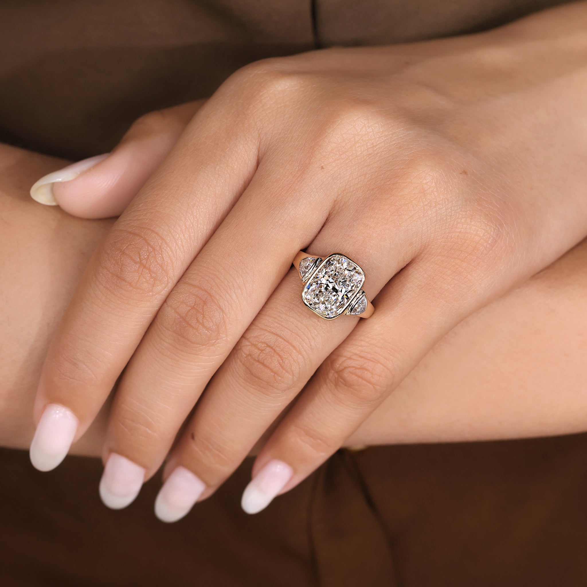 IGI Certified 5-10 Carat Elongated Cushion Cut Ring in bezel setting