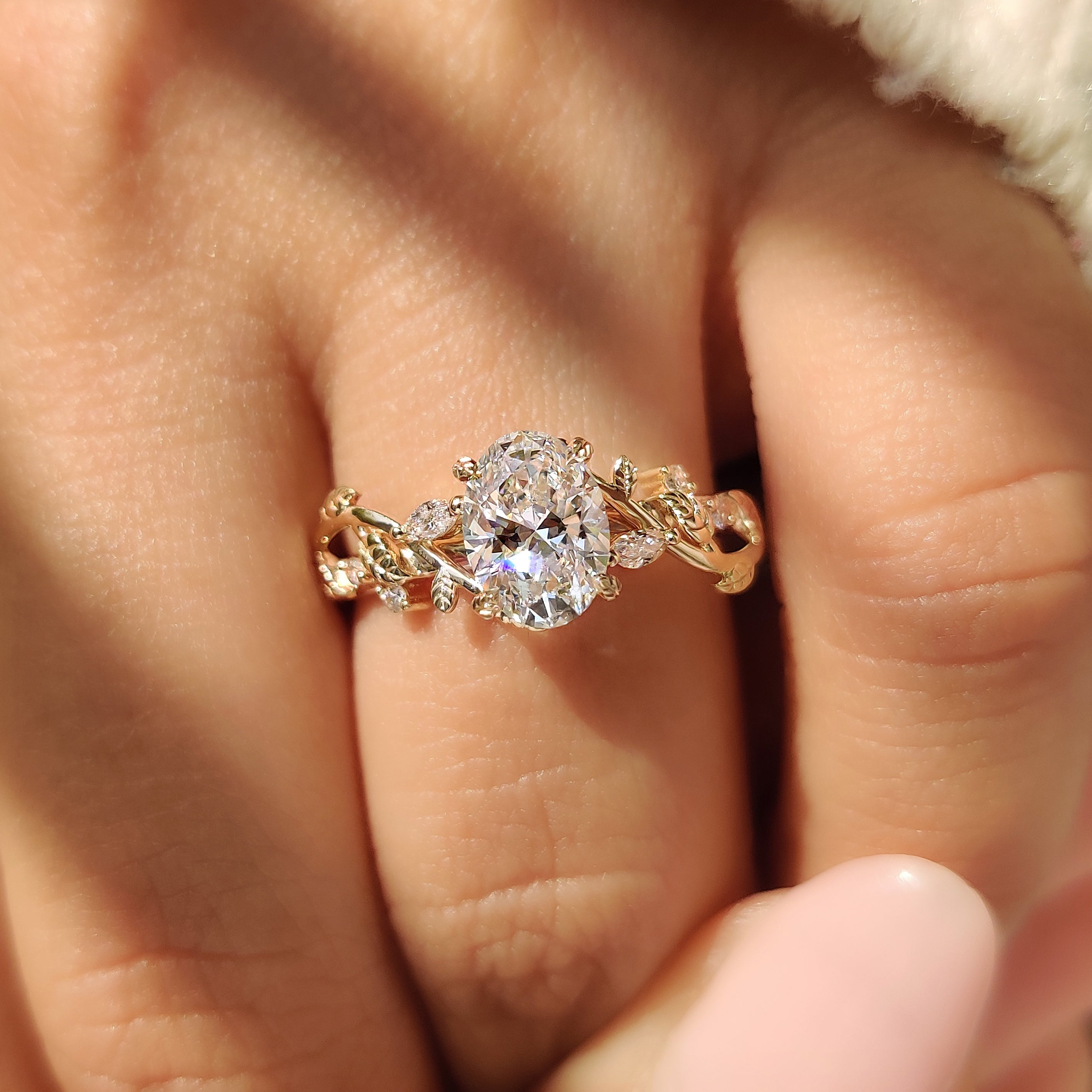Nature Inspired Oval Diamond Ring with Leaf Style Prong Setting