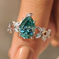 Cyan Blue Moissanite Pear Nature inspired Ring with Leaf Design