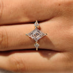 Lozenge Cut Engagement Ring with Kite Cut Side Stone