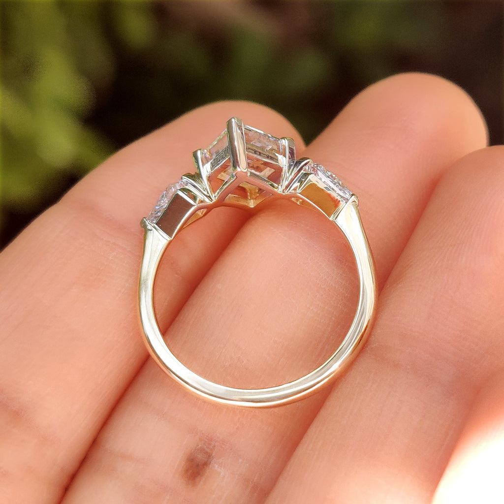 Lozenge Cut Engagement Ring with Kite Cut Side Stone