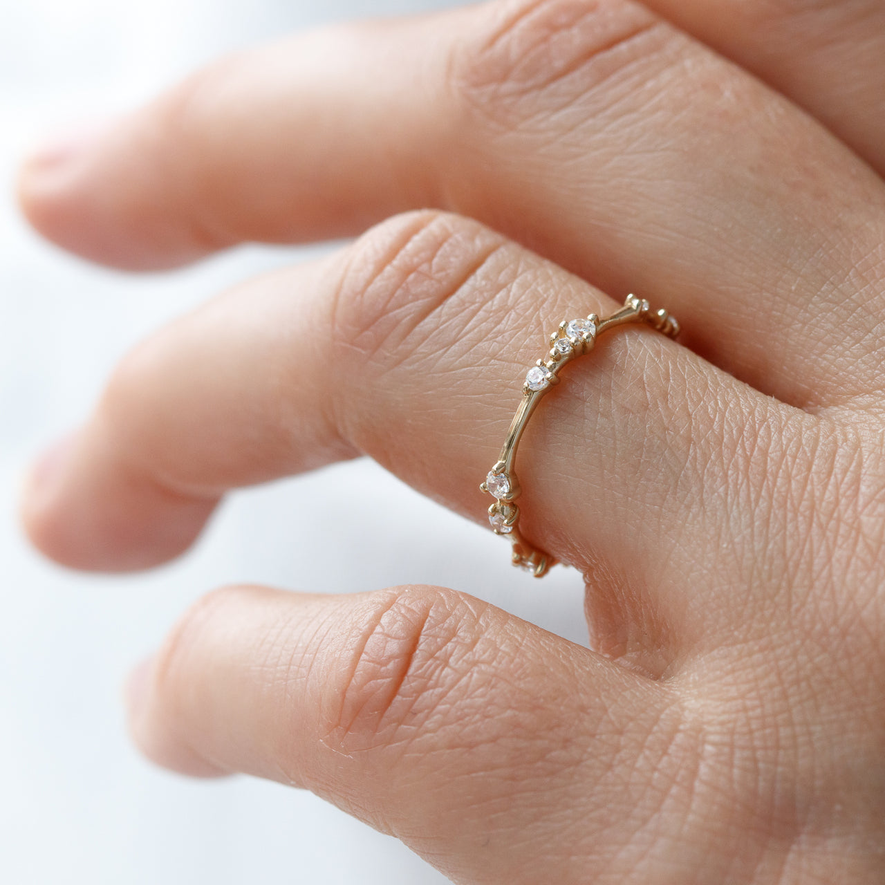 0.30 TCW Round Cut Dainty Style Moissanite Wedding Band