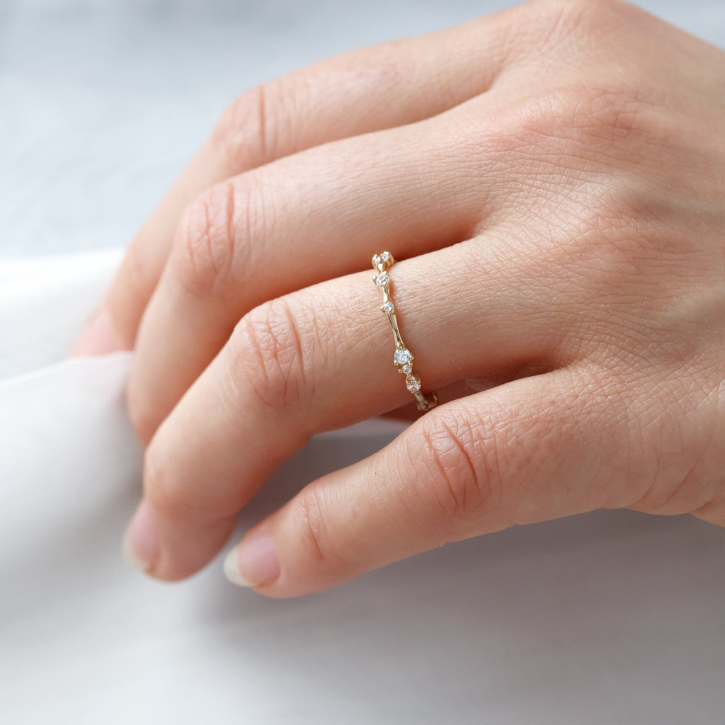 0.30 TCW Round Cut Dainty Style Moissanite Wedding Band