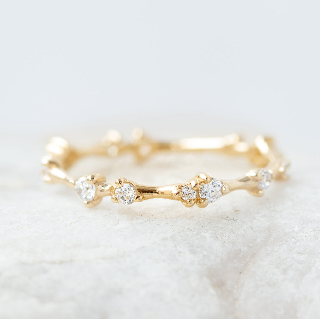 0.30 TCW Round Cut Dainty Style Moissanite Wedding Band