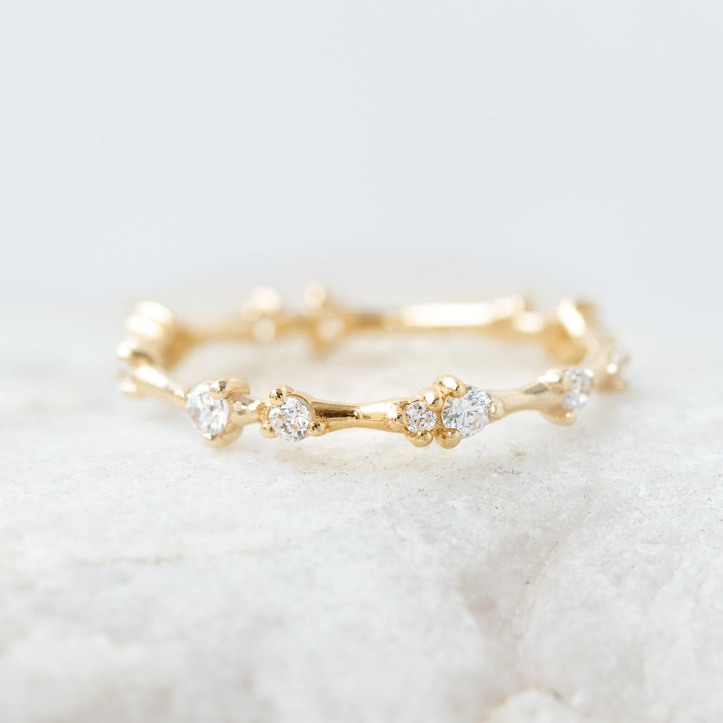 0.30 TCW Round Cut Dainty Style Moissanite Wedding Band