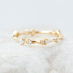 0.30 TCW Round Cut Dainty Style Moissanite Wedding Band