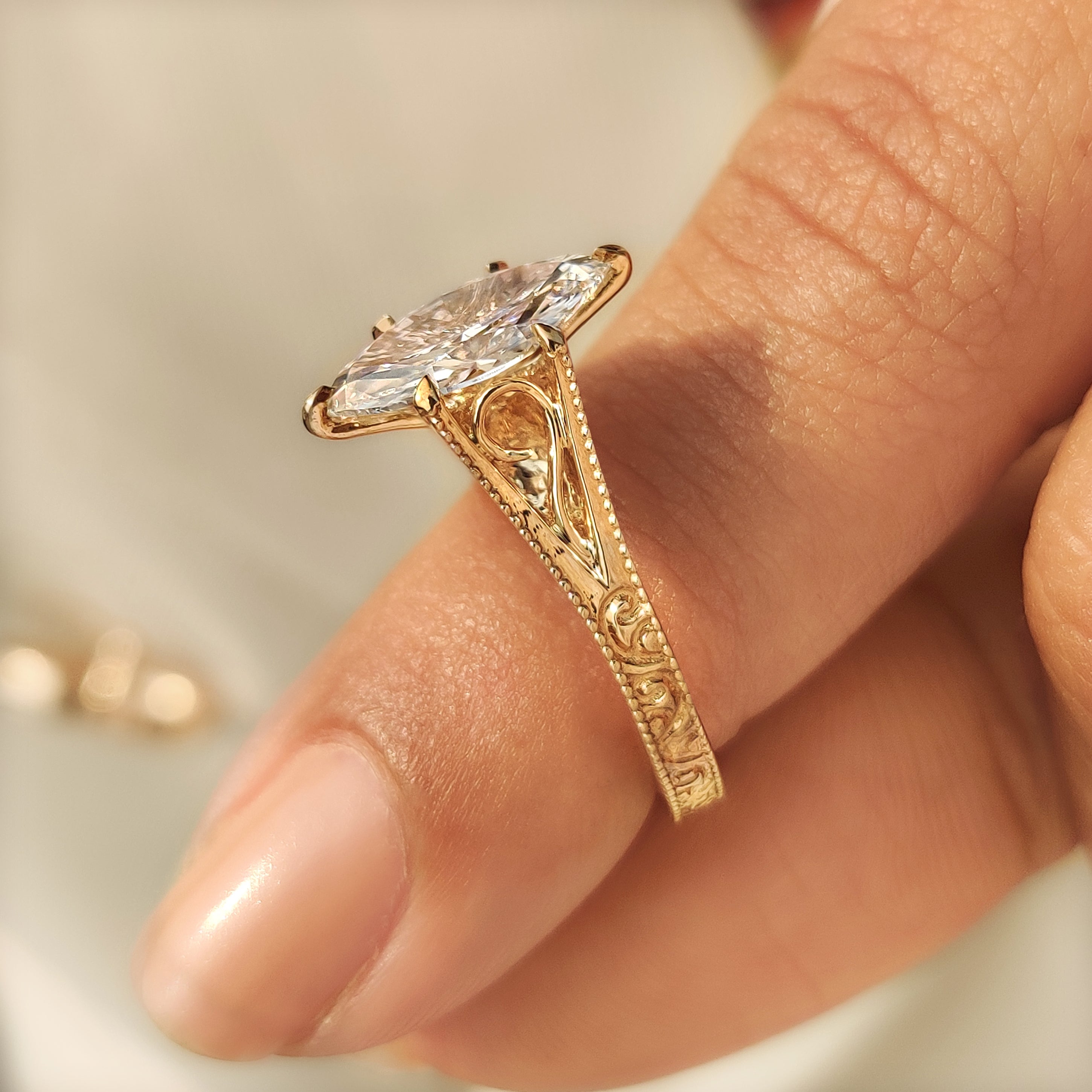 Solitaire Style Marquise Cut Diamond Ring in Milgrain Details