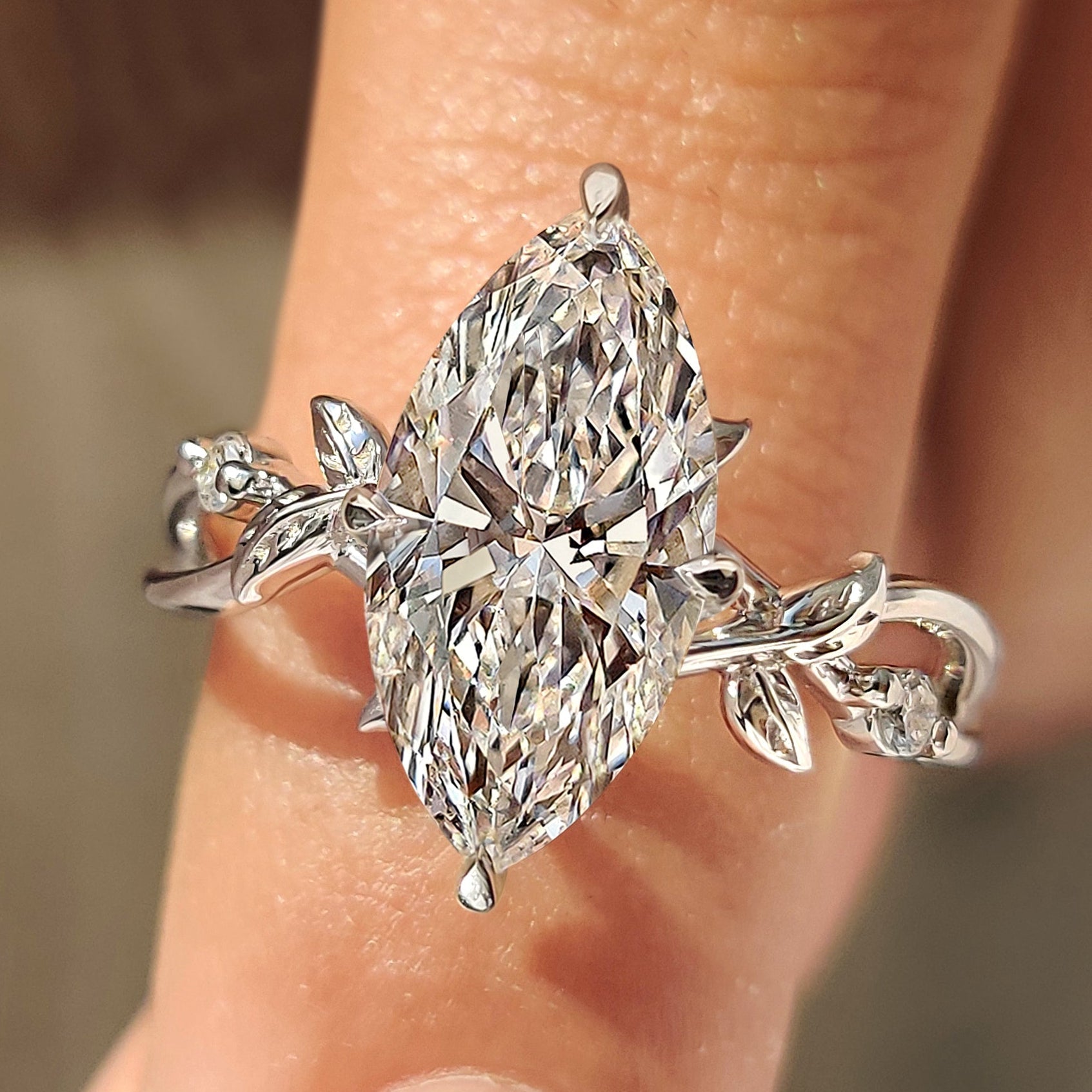 Marquise Cut Ring with Round Side Stone in Nature Inspired Style Main image