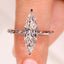 Elongated Marquise Engagement Ring In Distance Pave Style