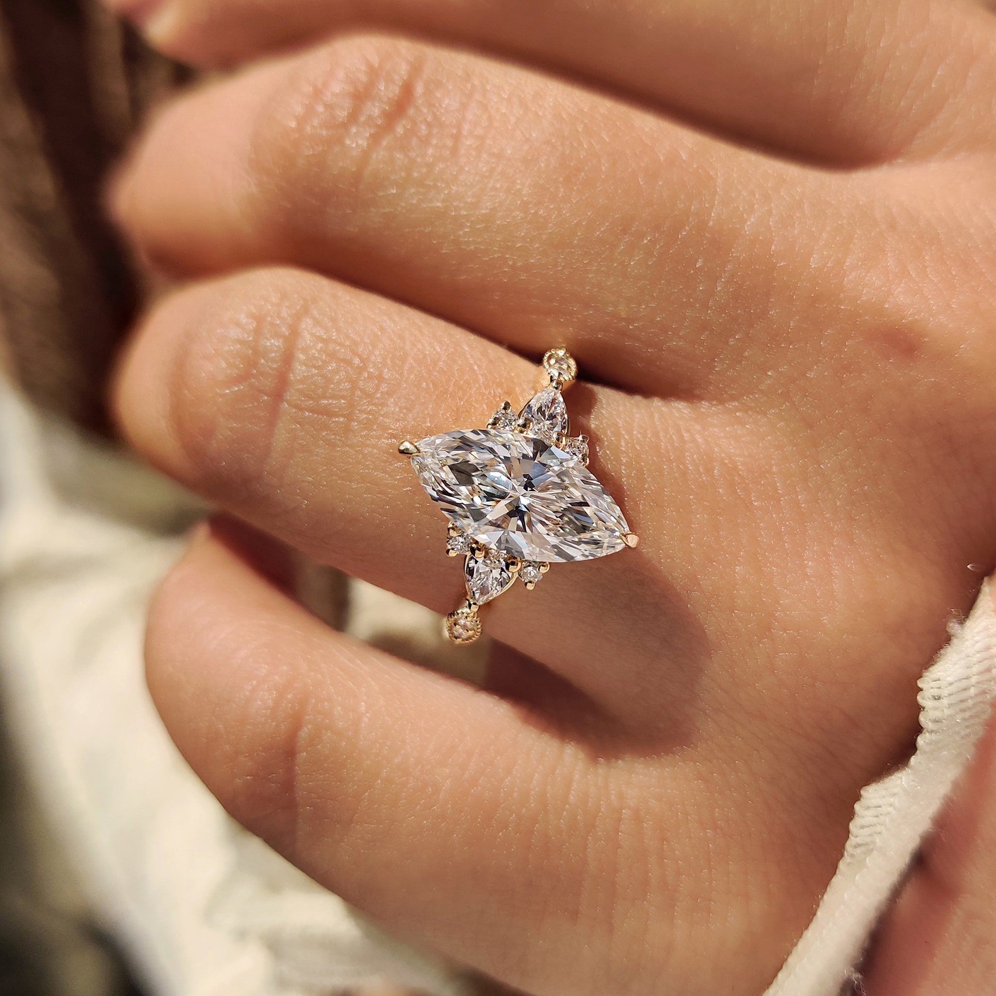 Marquise Cut Ring with Pear and Round Side Stones