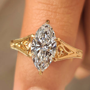 Solitaire Style Marquise Cut Diamond Ring in Milgrain Details