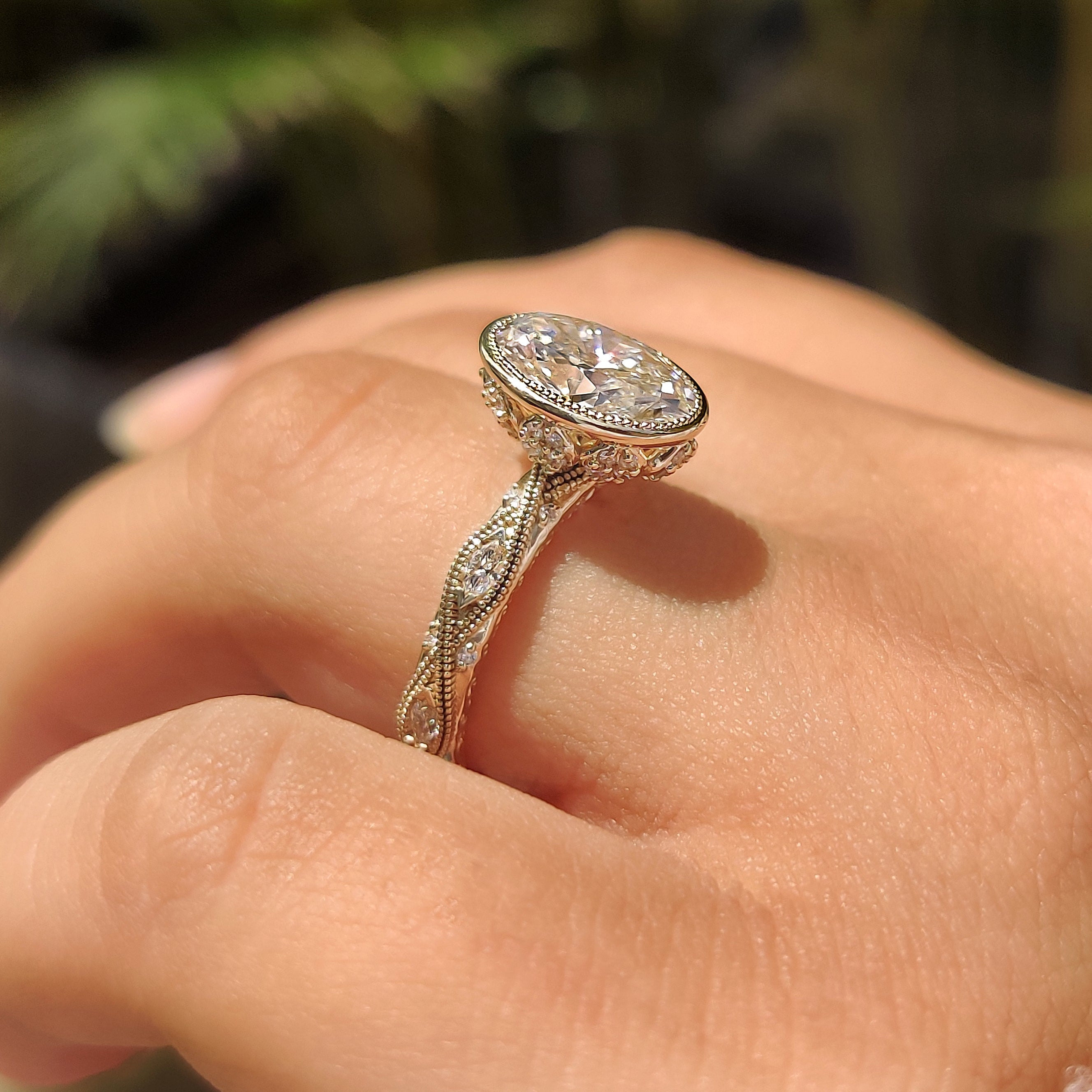 Oval Bezel Engagement Ring with Milgrain