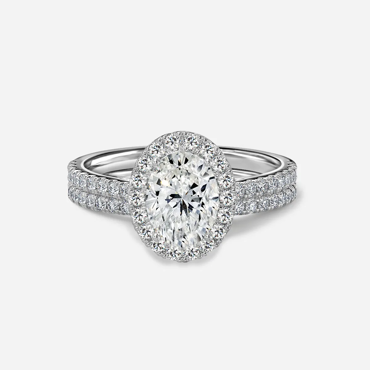 1.0 CT Oval Cut Moissanite Halo & Pave Bridal Ring Set