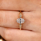 Oval Cut Diamond Ring With Round Side Stone Style