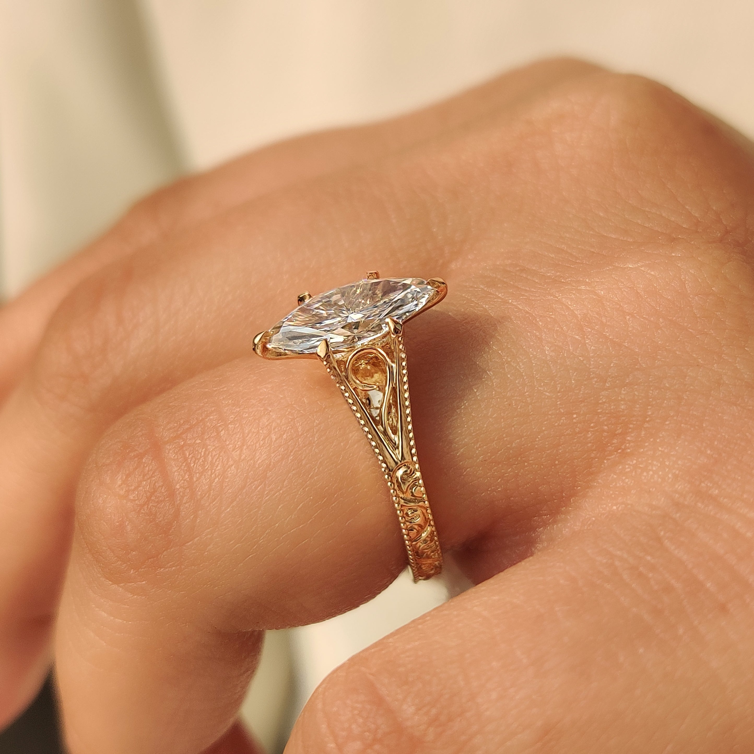 Solitaire Style Marquise Cut Diamond Ring in Milgrain Details