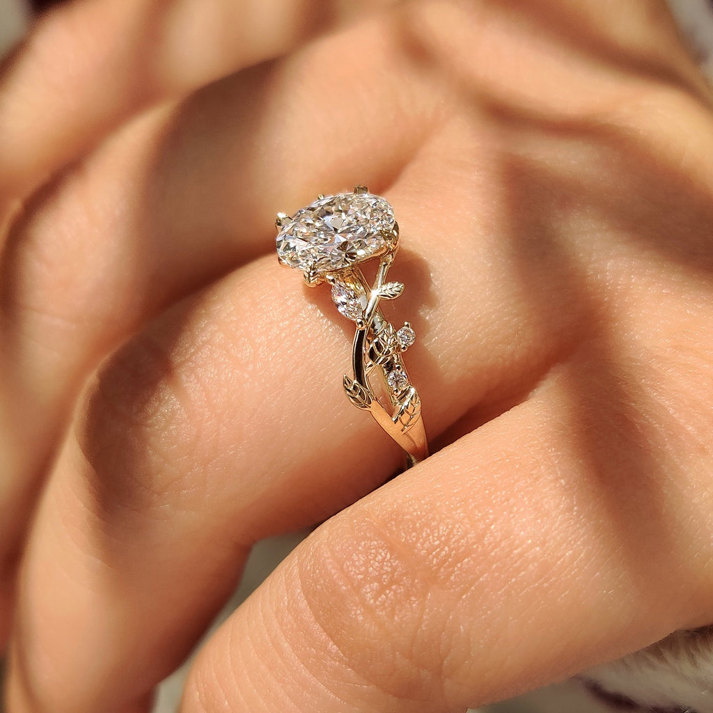 Nature Inspired Oval Diamond Ring with Leaf Style Prong Setting