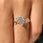 Nature Inspired Marquise Cut Engagement Ring with Round Side Stone