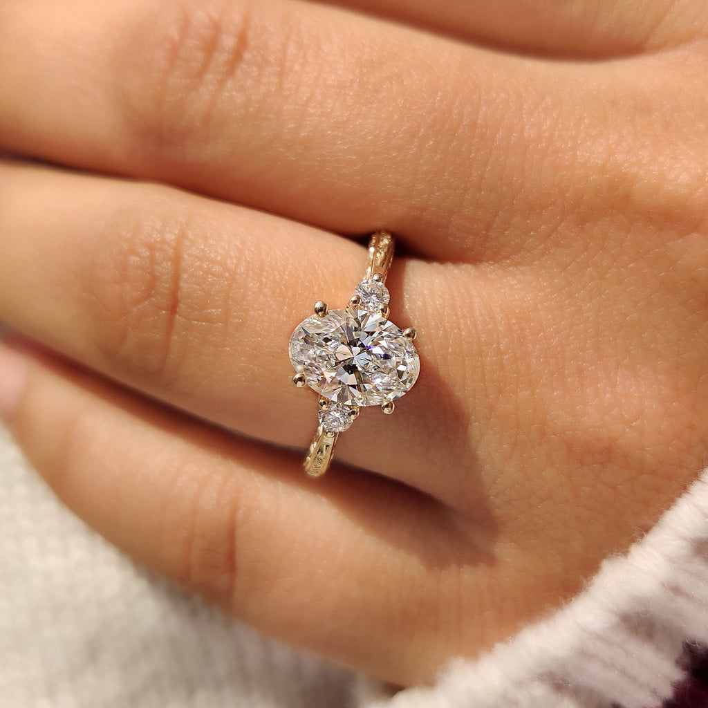 Oval Cut Vintage Engagement Ring with Filigree Design on Shank
