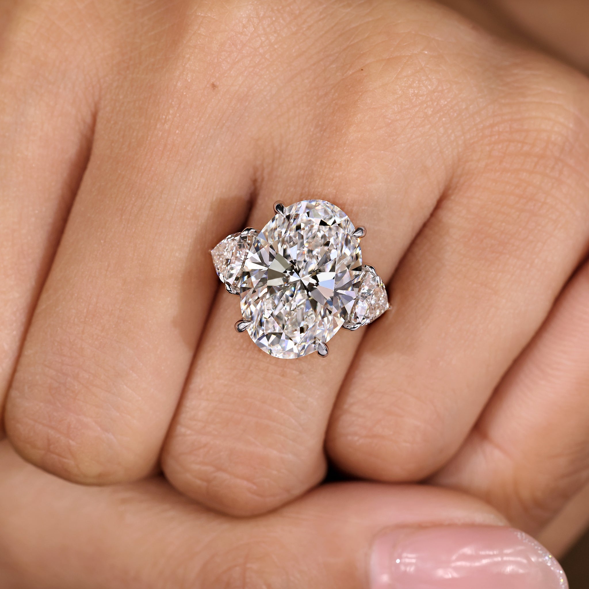 IGI Certified 10 -15 Carat Oval Diamond Ring in Three Stone Style