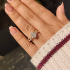 Nature Inspired Oval Diamond Ring with Leaf Style Prong Setting